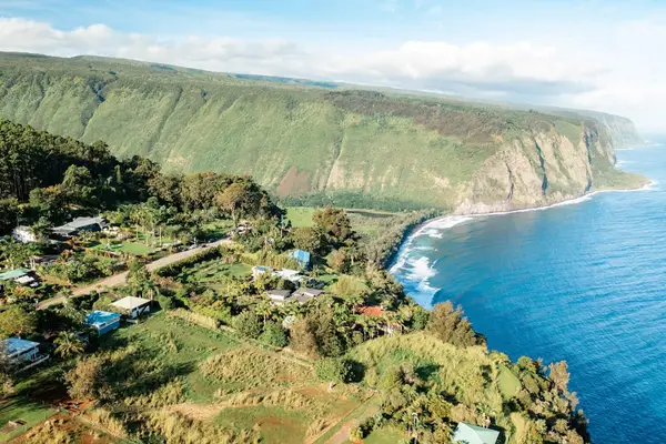 Spectacular Aerial View of Coastal Cliffs, Ocean Bay, & Surrounding Landscape