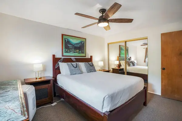 Bright Primary Bedroom With Island Charm