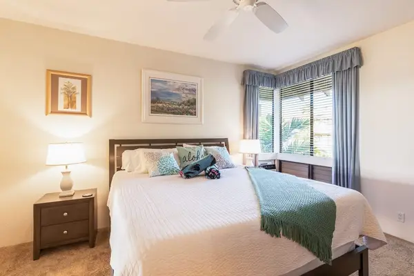Peaceful Bedroom With Balcony Views