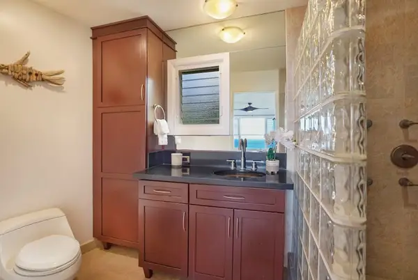 Elegant primary bathroom with dual vanity