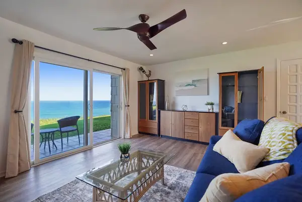 Cozy living room featuring ocean glimpses from the sofa