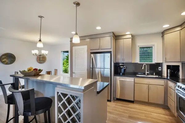 Open-concept dining area flowing into the kitchen