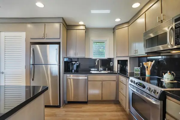 Fully equipped kitchen with stainless steel appliances