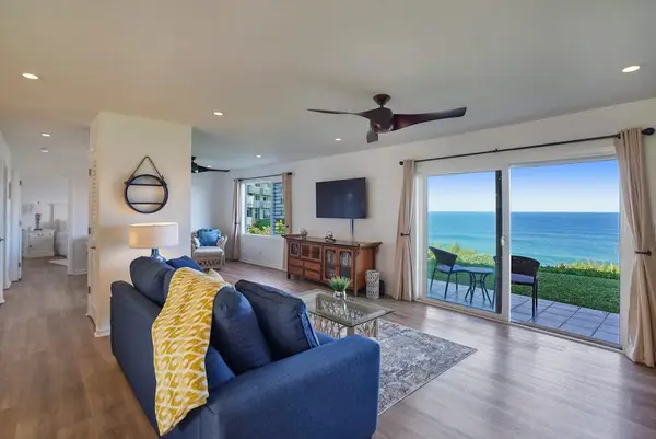 Bright living space with sliding doors leading to the lanai