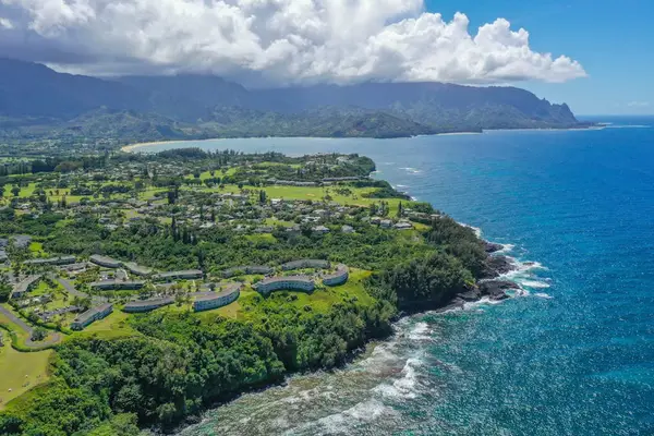 Sweeping aerial view of the ocean and coastal landscape