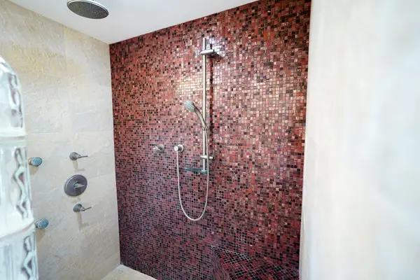 Spa-like primary bathroom with modern tilework