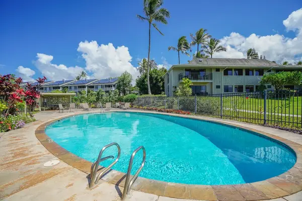 Inviting resort pool with comfortable lounge seating