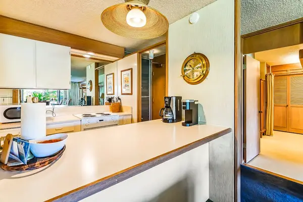 The breakfast bar creates the perfect spot for coffee or a quick bite.