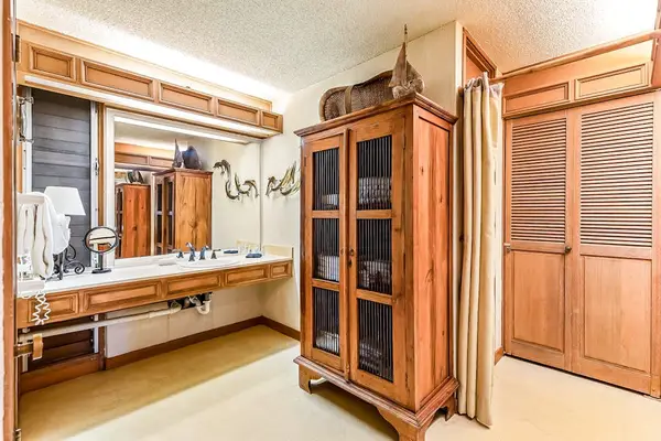 Enjoy a spacious bathroom vanity with ample room for your daily essentials.