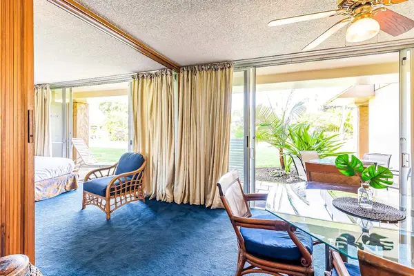 Enjoy indoor dining with relaxing tropical garden views just beyond the lanai.