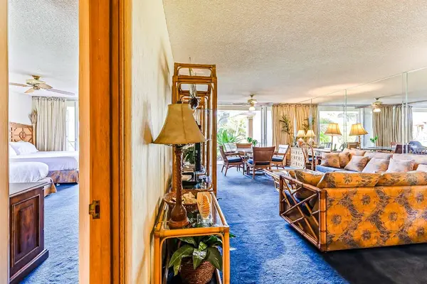 Relax in the spacious living room with a comfortable sofa bed for extra guests.