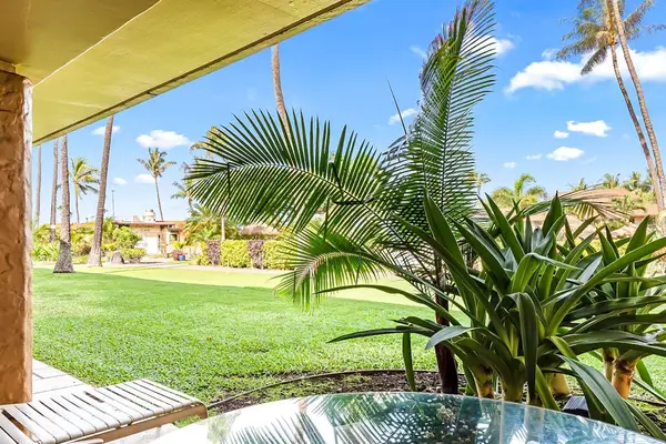 Step outside to a spacious tropical lawn just beyond your private lanai.