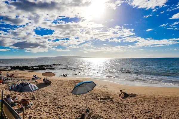 Unwind by the shore while taking in the sparkling ocean and beautiful island views