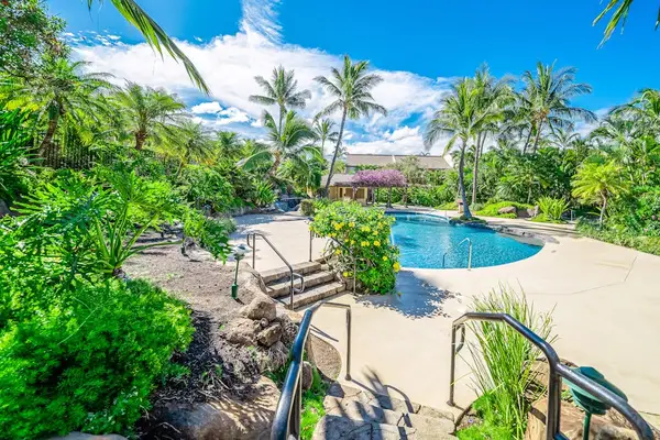 Resort Pool Surrounded By Palms