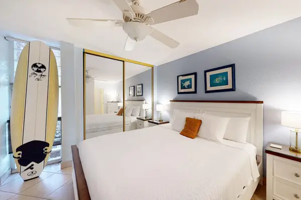 Guest room with king bed and local decor.