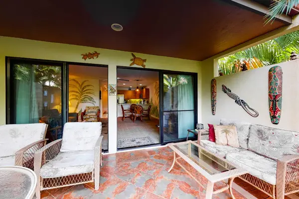 Private Patio Surrounded By Tropical Greenery