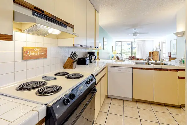 Spacious kitchen with ample cabinet storage and everything you need for easy meal preparation