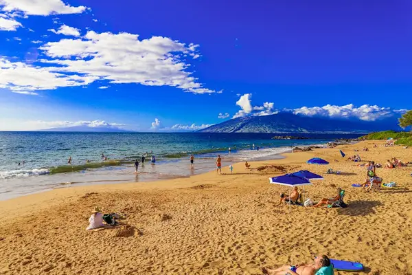 Golden sandy beach with stunning ocean and island views