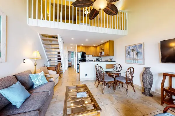 Open Living Space With Island Charm