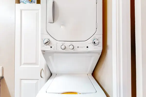 In-Unit Stacked Washer and Dryer for Added Guest Convenience