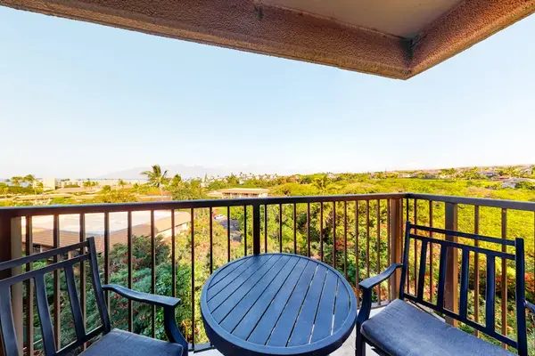 Private Balcony Patio Table and Seating with Scenic Mountain Views