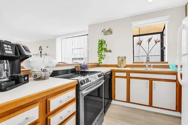 Well-Equipped Kitchen prep station with Coffee Maker & Stove