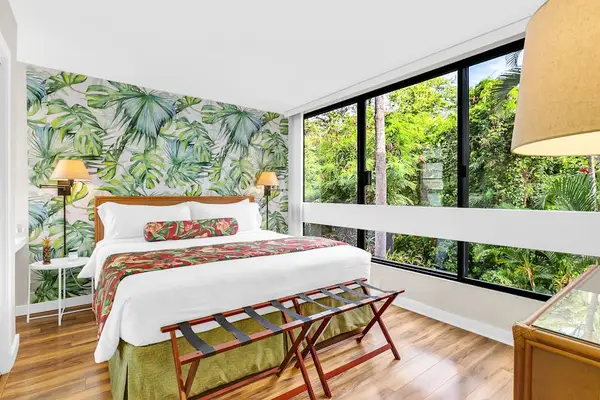 Spacious Bedroom with Tropical Wall Mural & Garden Views