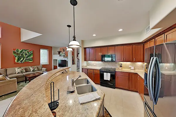 Large open state of the art and fully stocked kitchen.