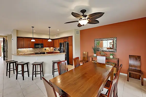 Dining room with seating for eight and four barstools allowing for everyone to spread out.