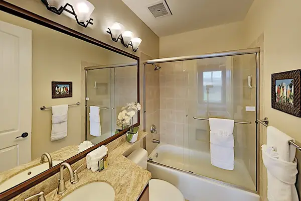 Guest bathroom with tub/shower combo.