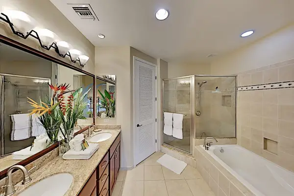 Master en-suite bathroom with double sinks, garden tub and walk-in shower.