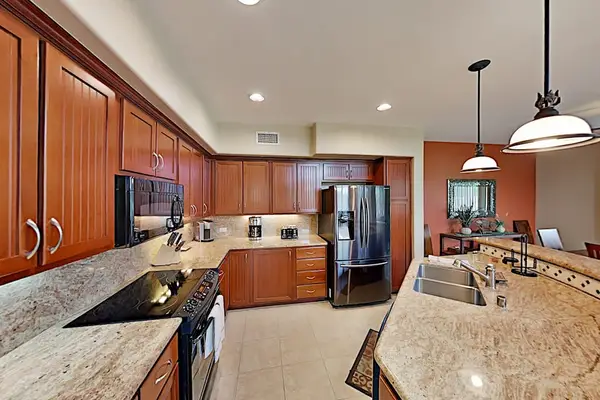 Newly remodeled kitchen with full size appliances for all of your chef's needs.