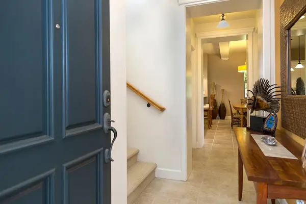 Welcoming Entry Foyer with Staircase Access & Foyer Table