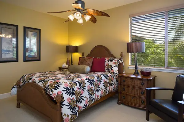 Warm Guest Bedroom Layout with Bedside Storage & Window Blinds