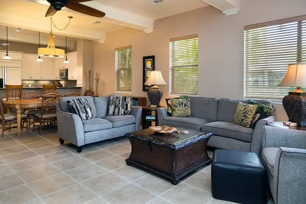 Sunlit Living Room Suite with Plush Sofas & Garden Views