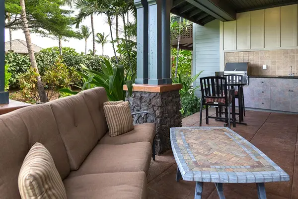 Private Covered Lanai Lounge with Outdoor Sofa & Coffee Table