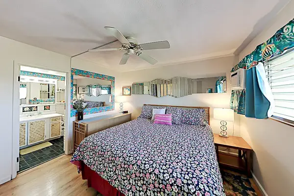 Rest comfortably in this bright and inviting bedroom