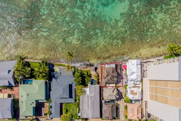 Aerial view showcases the home's inviting layout and peaceful surroundings beautifully together