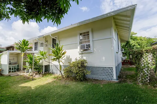 Relax outdoors in the peaceful backyard surrounded by tropical island charm daily