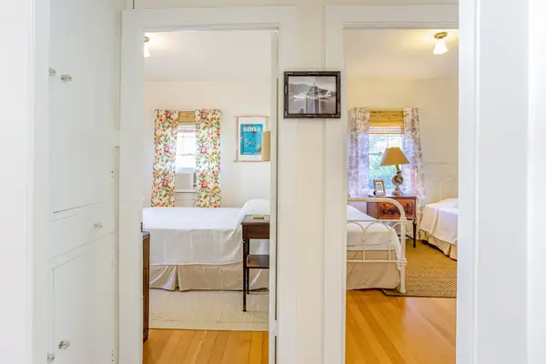 Convenient layout connects the living room with both inviting bedrooms for everyone