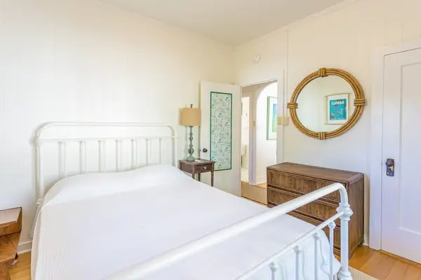 First bedroom offers a comfortable queen bed for restful nights every stay