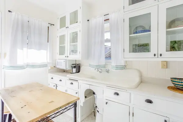 Prepare favorite recipes in this bright cottage kitchen every single day together