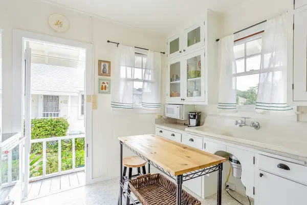 Kitchen and extra dining table offer comfort, convenience, and shared vacation moments