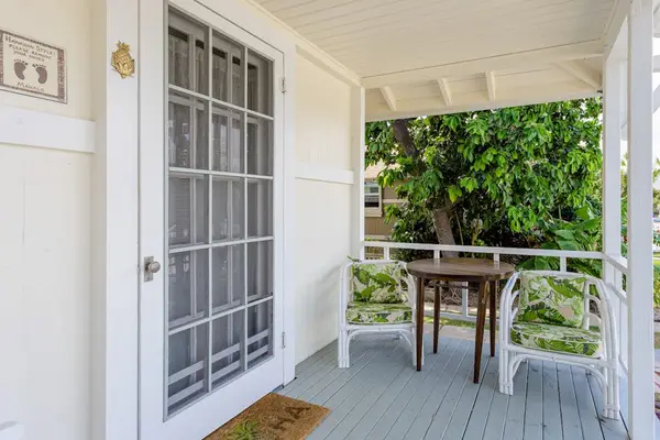 Step inside and begin your relaxing vacation from this welcoming cottage entrance