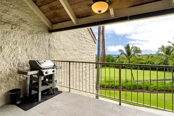 Convenient barbecue grill station located on the covered balcony for outdoor cooking