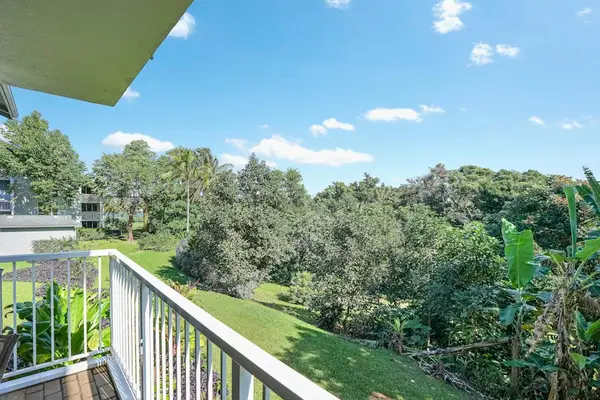 Serene Lanai Overlooking Lush Gardens