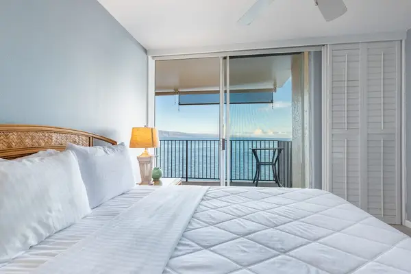 Master bedroom with queen bed and a private lanai.