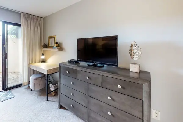 Spacious Bedroom With Smart TV