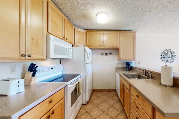 Spacious Kitchen With Breakfast Bar