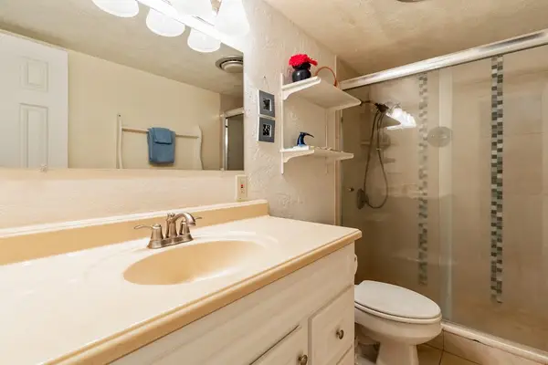 Clean Full Bathroom With Walk-In Shower